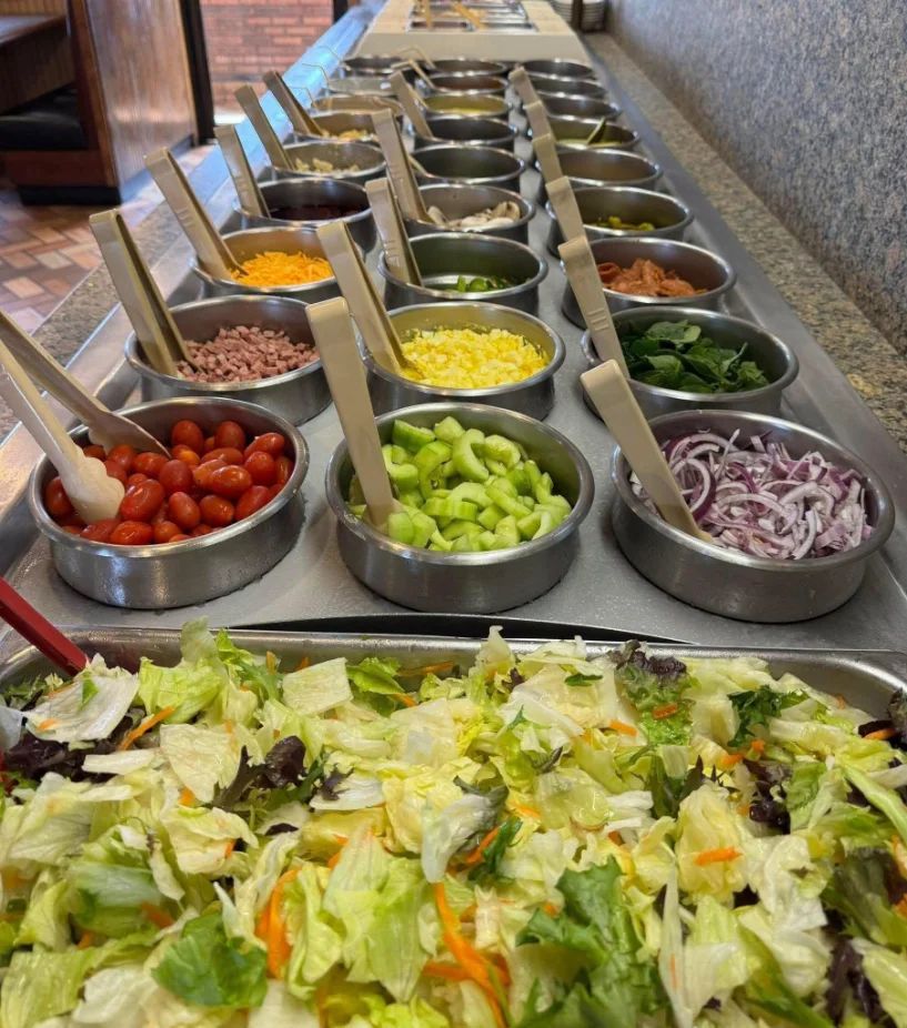 The salad bar at Grecian Steak House, stocked and ready in the dining room